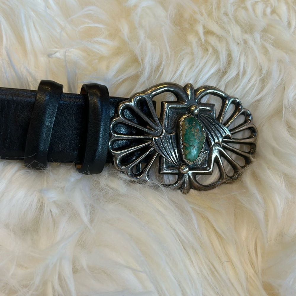 Black leather men’s belt with silver and turquoise buckle